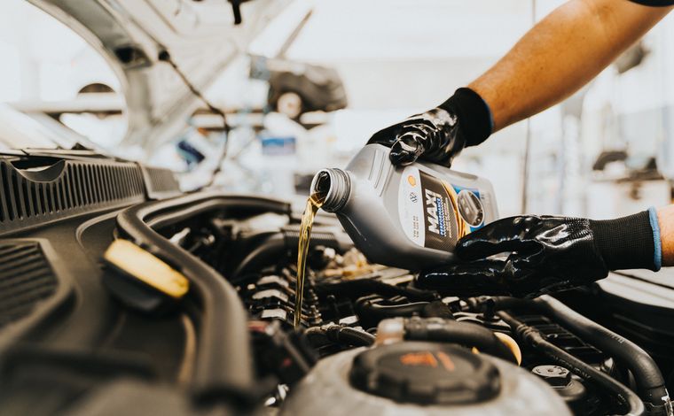 Engine oil being poured during an oil change